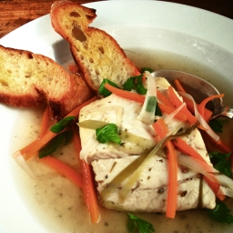 Whitefish Fillets Poached in Chardonnay Broth with Leeks, Carrots, and Bread Toasts